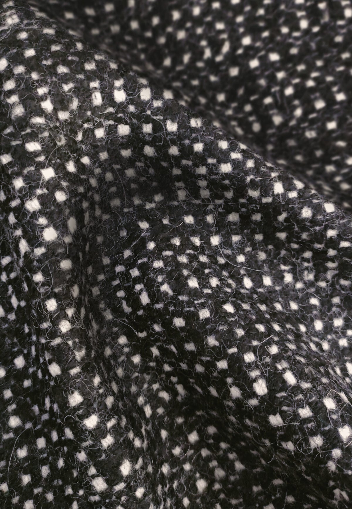 Manteau court zippé en laine noir et blanc