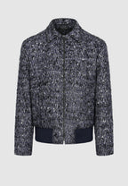 Blouson zippé en tweed de laine chiné bleu, noir et blanc