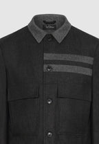 Blouson boutonné en flanelle grise à découpes contrastées